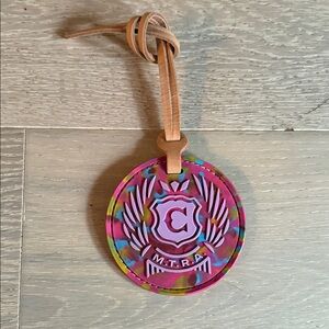 NWOT Colorful Round Luggage Tag with Crest Detailing